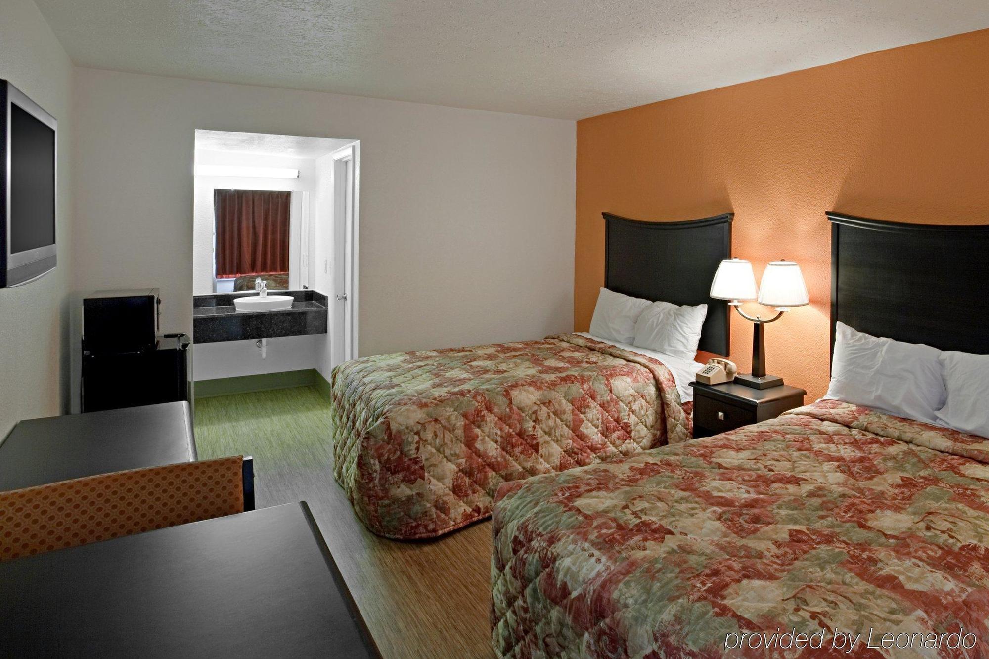 Econo Lodge Метрополіс Номер фото